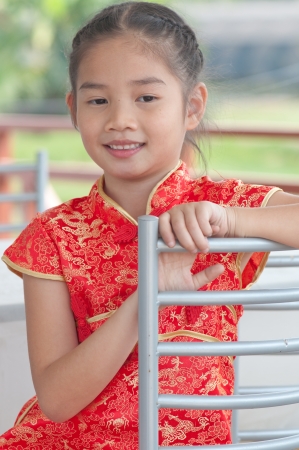 Portrait of oriental girl in Chinese style dress, Thailand.の写真素材