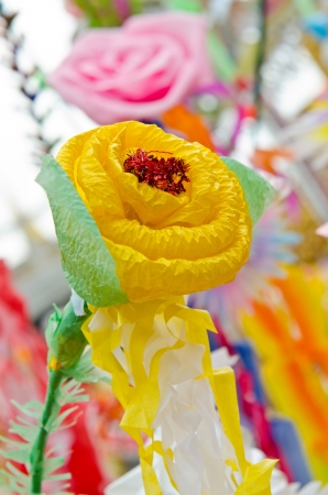 Yellow rose made from plastic ribbon, Thailand.の写真素材