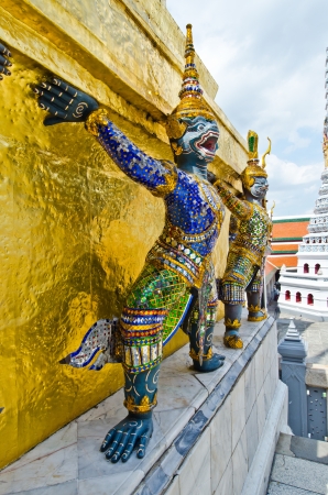 A giant statue at Wat Phra Kaew temple, Thailand.の写真素材