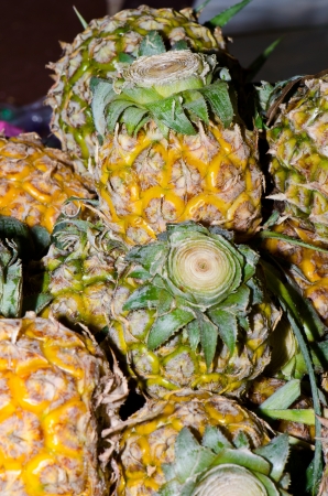 Group of pineapples at the market, Thailand.の写真素材