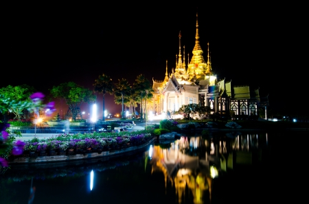 Beautiful Thai style church in night scene, Thailand の写真素材