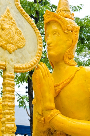 Angel statue made from candle in candle festival, Thailand の写真素材