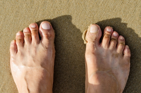 Foot on sand, Thailand.の写真素材