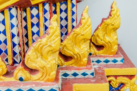 Thai style molding art at temple, Thailandの写真素材