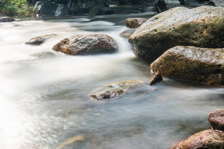 Beautiful water flowing at natural park, Thailandの写真素材
