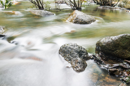 Beautiful water flowing at natural park, Thailandの写真素材