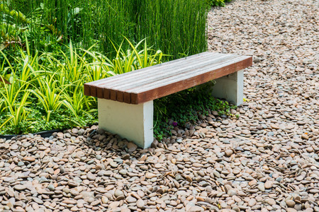 Modern wooden bench in the garden, Thailandの写真素材