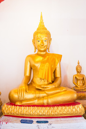 Golden buddha at Thai temple, Thailandの写真素材
