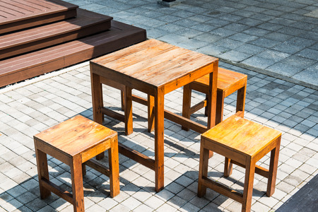 Wooden Table Set on Concrete Block Yard, Thailand.の写真素材