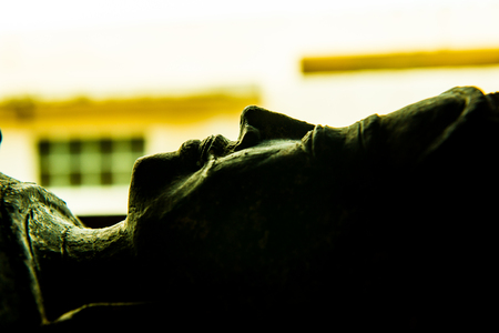 Silhouette of buddha face, Thailand.の写真素材