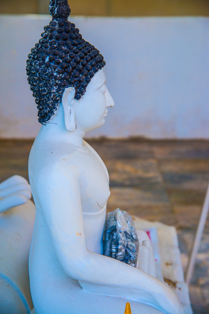 White buddha statue at Nakhonsawan province, Thailand.の写真素材