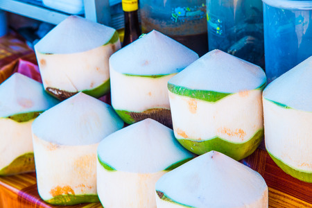 Fresh coconuts on sale stand, Thailandの写真素材