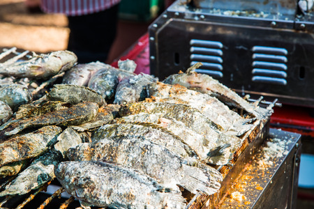 Salt grilled fish on sale stand, Thailand