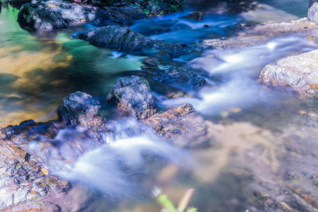 Water Flowing in Khlong Lan Waterfall, Thailandの写真素材