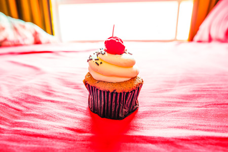 Cupcake on pink cloth, Thailandの写真素材