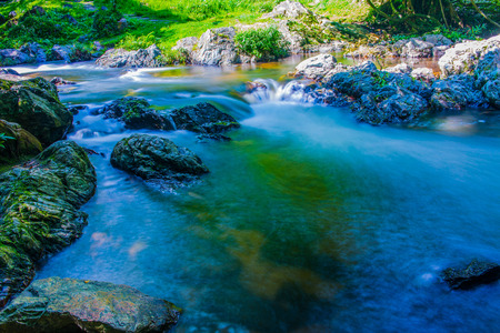 Water Flowing in Khlong Lan Waterfall, Thailandの写真素材