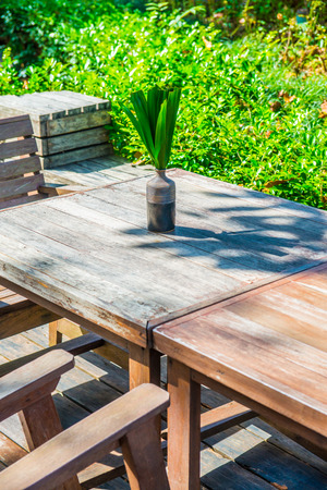 Table set with chairs in the park, Thailand.の写真素材