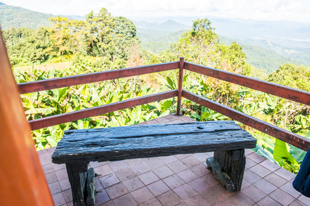 Wooden bench for view watching on mountain, Thailand.の写真素材