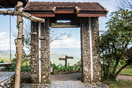 Natural view see through door frame at Huai Nam Dang national park, Thailand.の写真素材