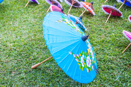 Thai native umbrella on ground, Thailand.の写真素材