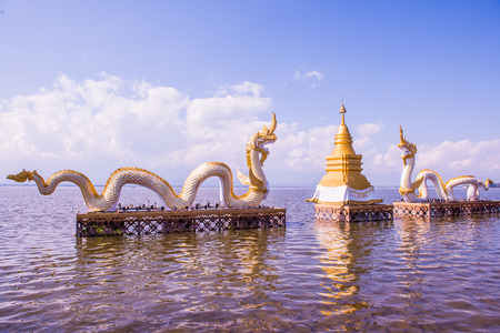 White Naga statue at Kwan Phayao, Thailand.の写真素材