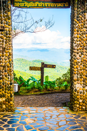 Natural view see through door frame at Huai Nam Dang national park, Thailand.のeditorial素材