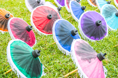 Thai native umbrella on grass, Thailand.の写真素材