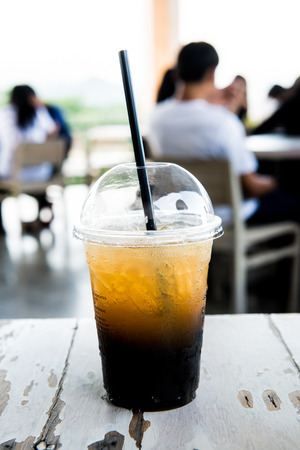 Iced Honey Lemon Oolong in Plastic Glass, Thailand.の写真素材