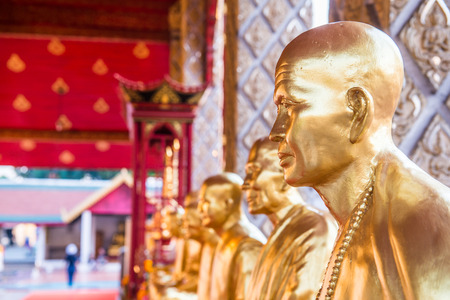 Kruba Srivichai statue at Phrathat Hariphunchai temple, Thailand.の写真素材