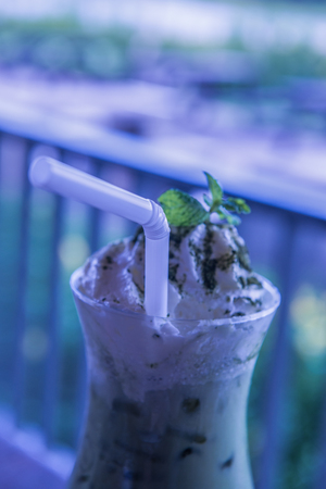 Iced green tea with whipped cream, Thailand.の写真素材