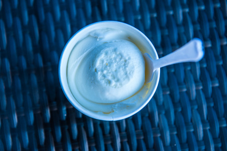 White ice cream with white paper cup, Thailand.