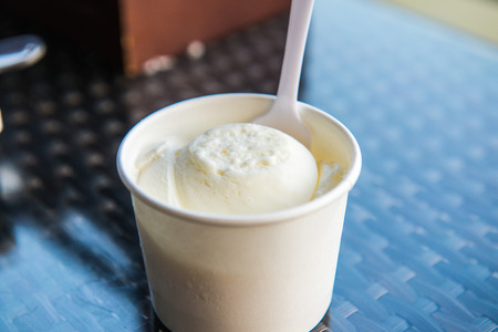 White ice cream with white paper cup, Thailand.の写真素材