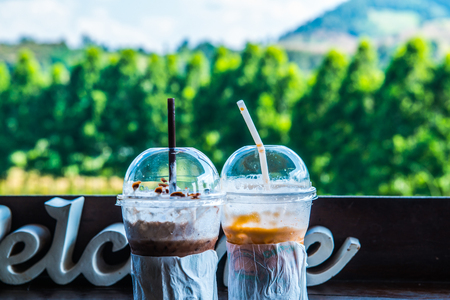 Iced Milk Tea and Iced Cocoa in Plastic Glass, Thailand.の写真素材