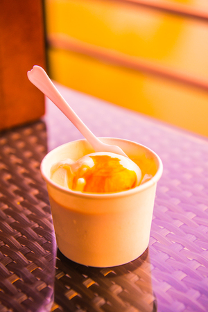White ice cream with white paper cup, Thailand.の写真素材
