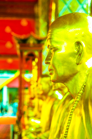 Kruba Srivichai statue at Phrathat Hariphunchai temple, Thailand.のeditorial素材