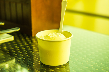White ice cream with white paper cup, Thailand.の写真素材