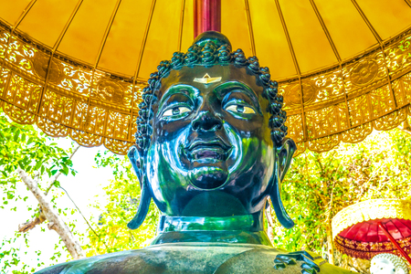 Black Buddha on mountain, Thailand.の写真素材