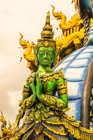 Sculpture of green angel at Rong Sua Ten temple, Thailand.の写真素材