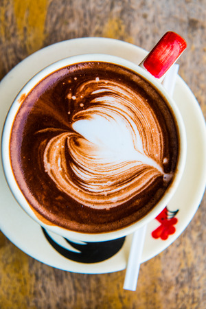 Hot chocolate in Thai style cup, Thailand.の写真素材