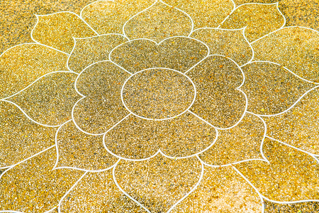 Thai style art on washed gravel floor, Thailand.の写真素材