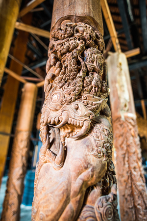 Carving art on wooden column, Thailand.のeditorial素材