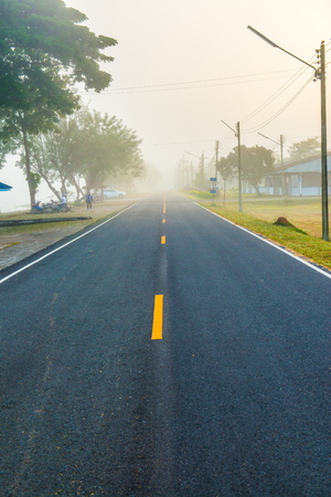 Running track with mist in winter season at Phayao province, Thailand.の写真素材