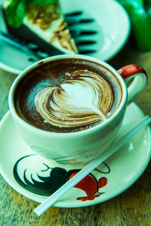 Hot chocolate in Thai style cup, Thailand.の写真素材