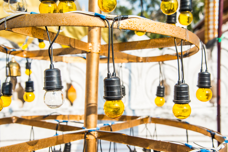 Yellow electric lamp, Thailand.の写真素材
