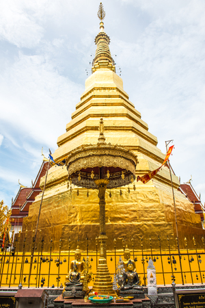 Golden pagoda in Phra That Cho Hae temple, Thailand.の写真素材