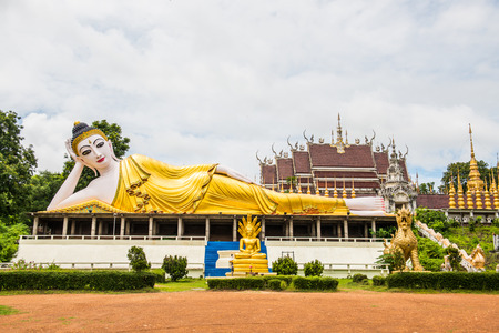 Beautiful reclining Buddha statue at Phra That Suthon Mongkhon Khiri temple, Thailand.の写真素材