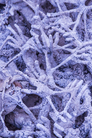 Hands molding art at Rong Khun temple, Thailand.の写真素材