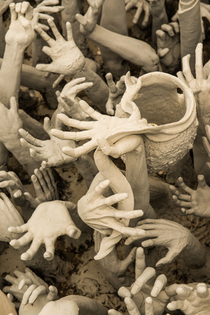 Hands molding art at Rong Khun temple, Thailand.のeditorial素材