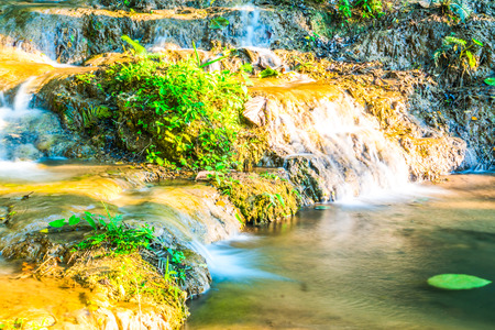 Water flowing at Tan Tong waterfall, Thailand.の写真素材