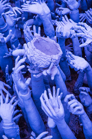 Hands molding art at Rong Khun temple, Thailand.のeditorial素材